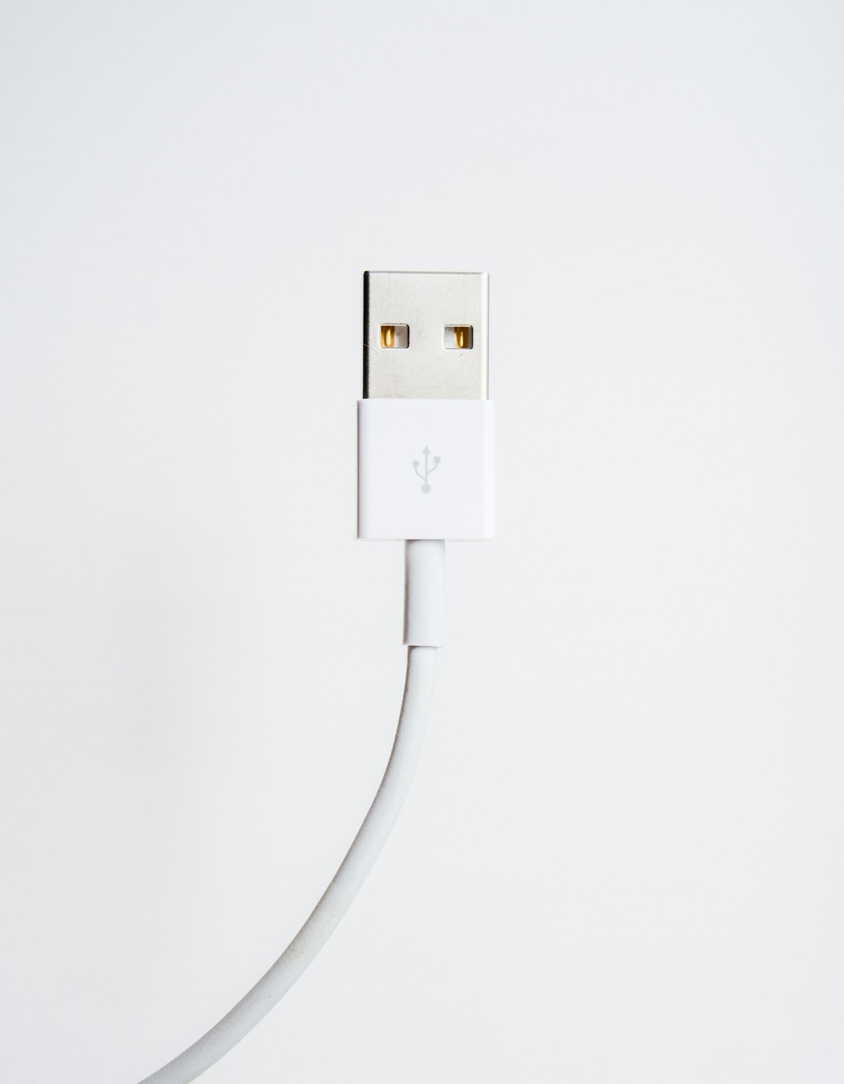 Minimal white door set into a pale wall